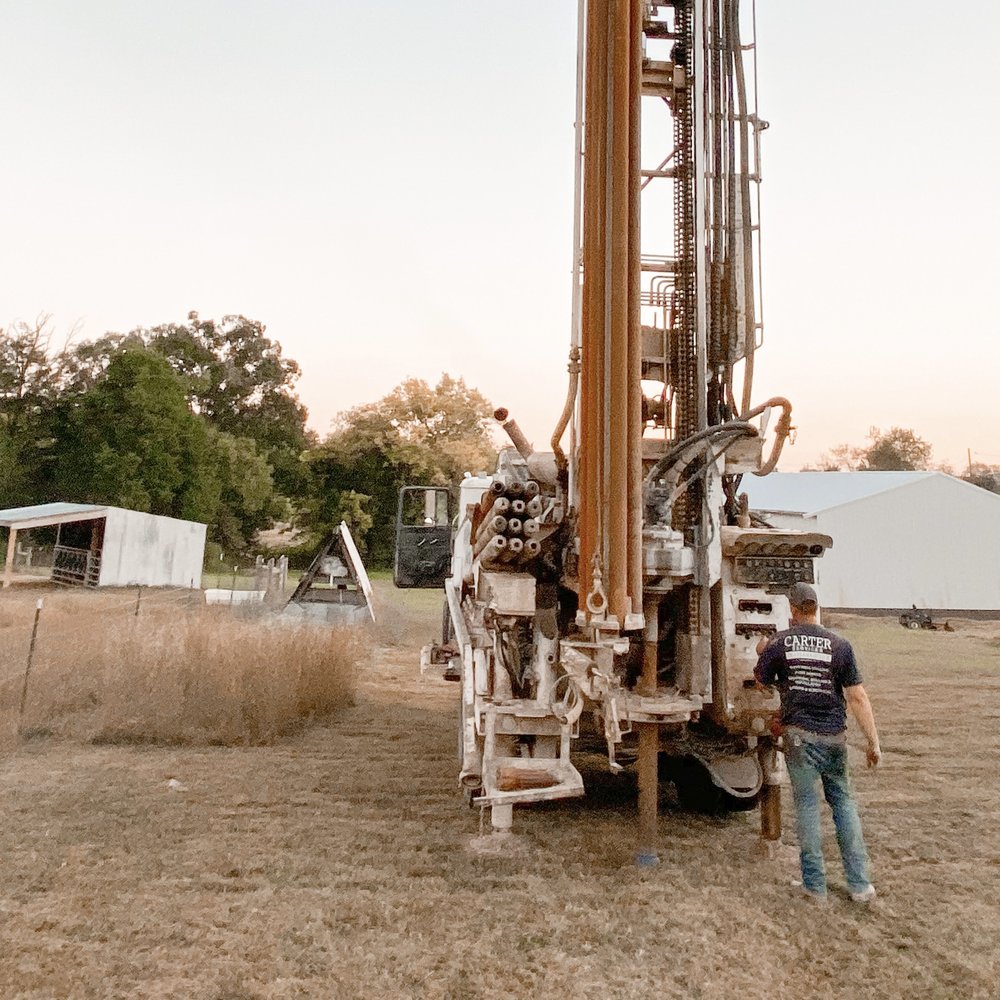 Water well drilling rig operating in Richmond